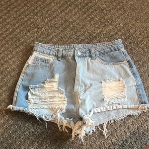 Two shaded ripped denim shorts